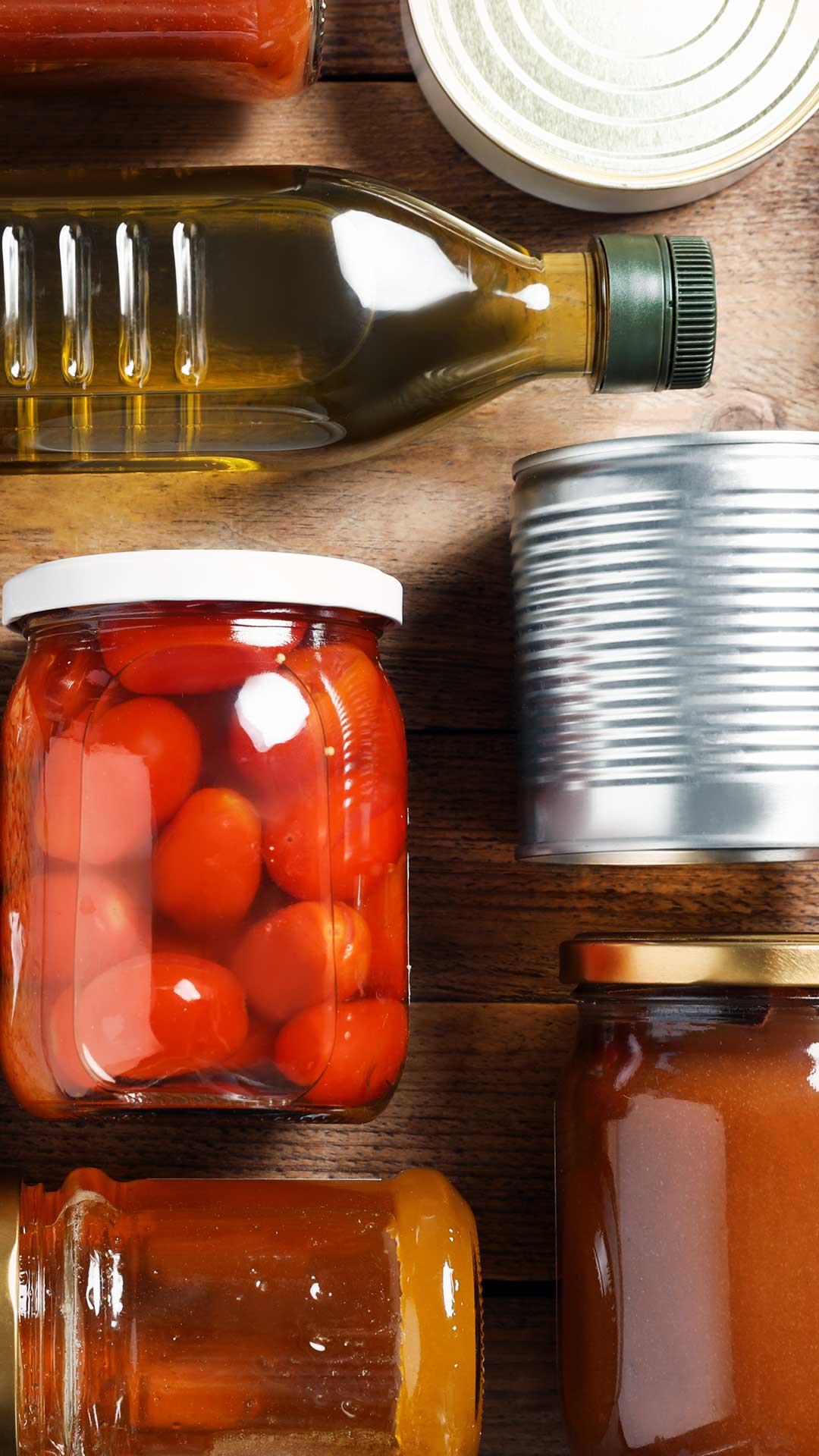 Overhead shot of assorted jars and canned food