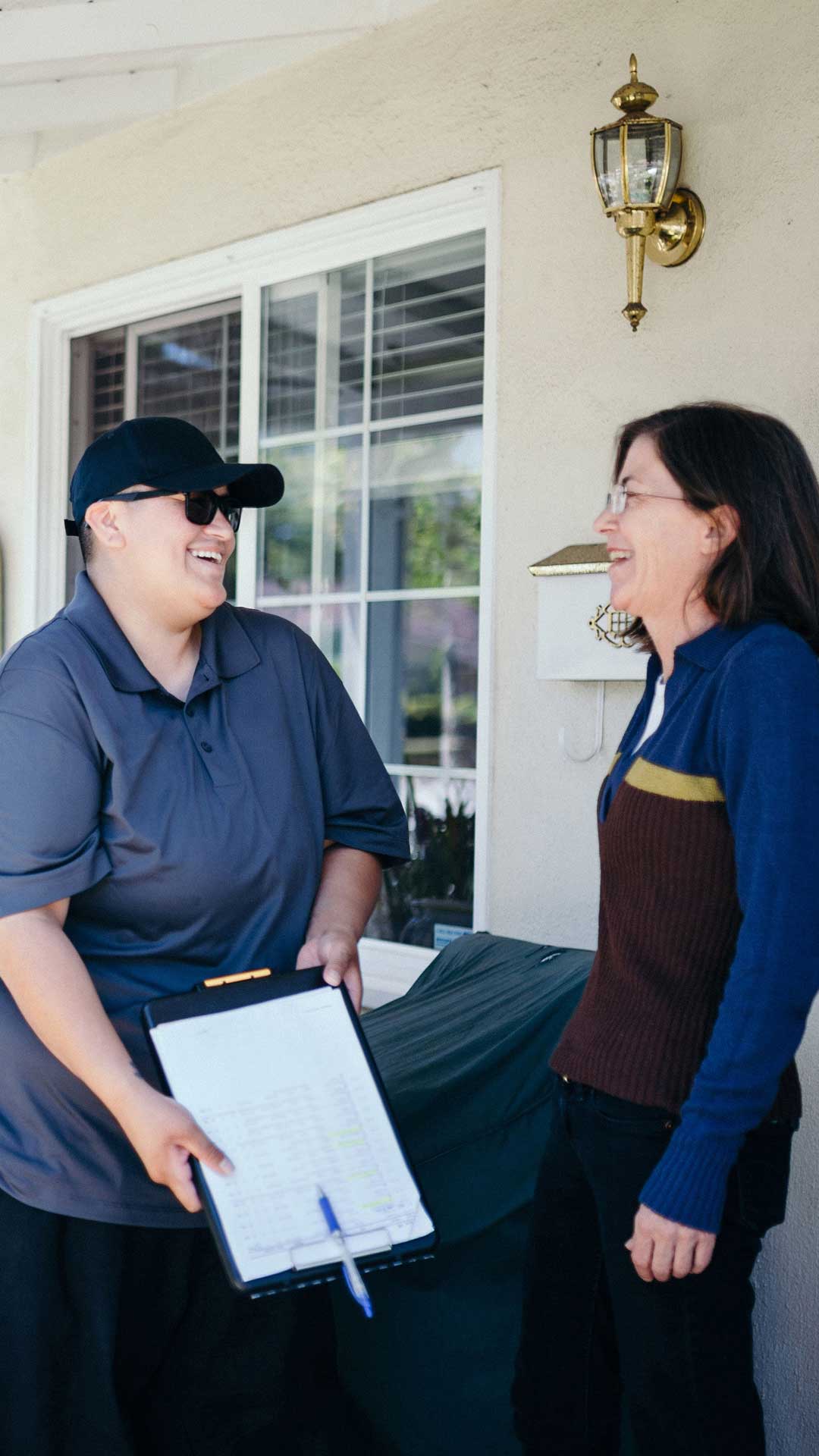 Traditions Meal driver having a happy conversation with customer