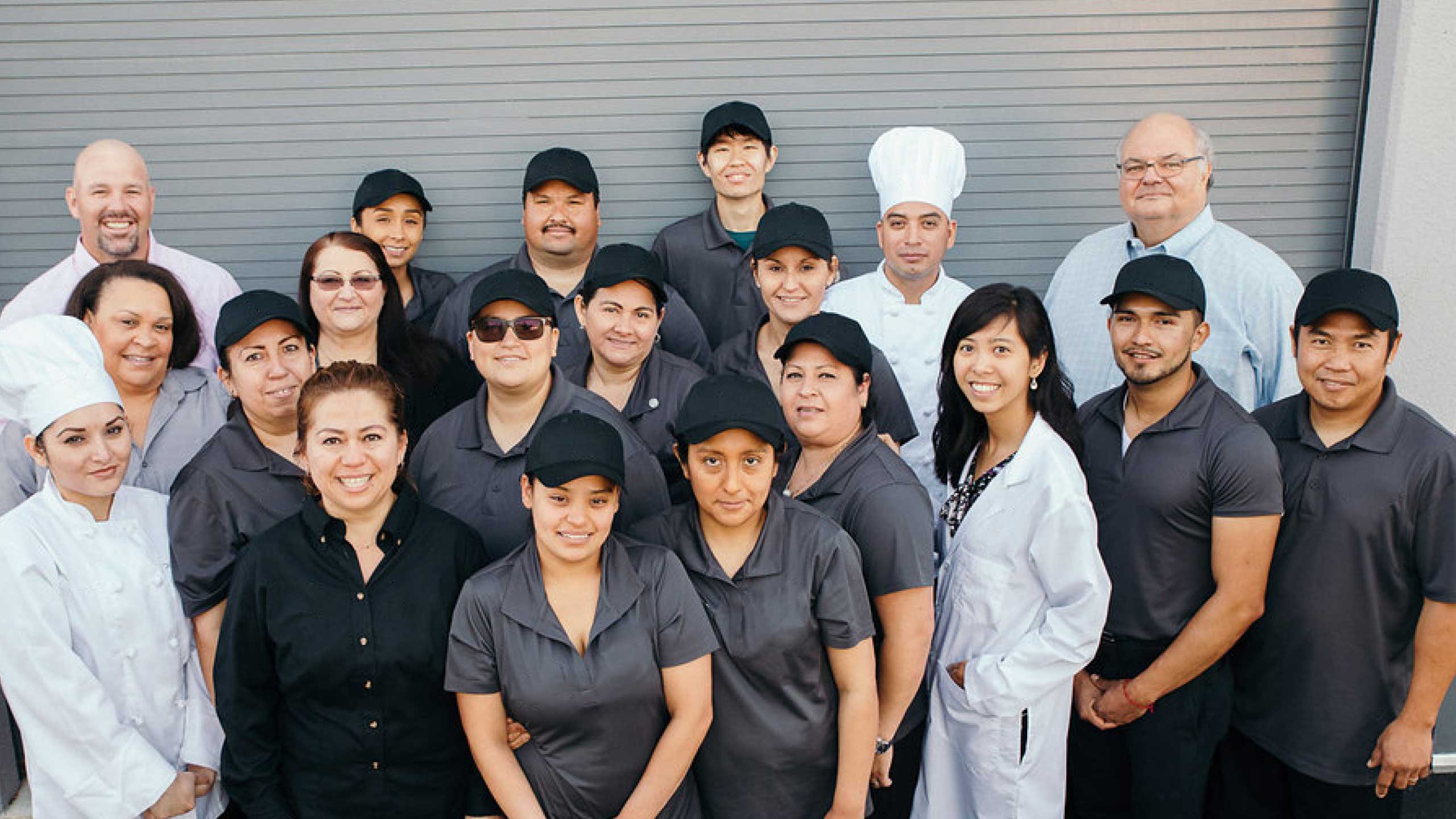 Large group of Traditions Meal employees smiling