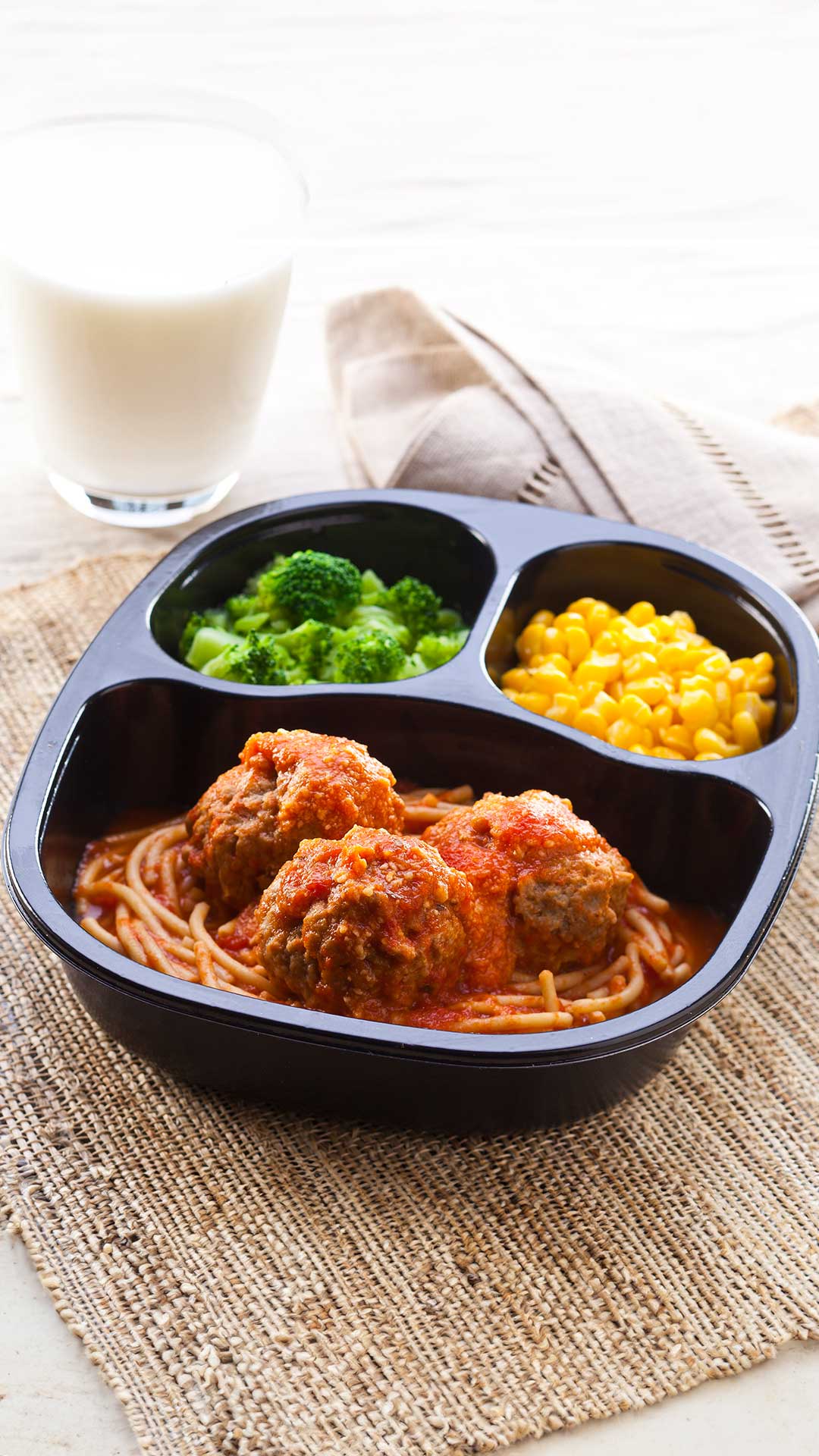 Spaghetti & Meatballs with Whole Kernel Corn & Broccoli Florets | a frozen meal solutions from Traditions