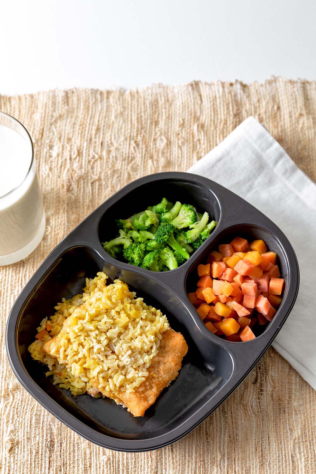 Breaded Pollock with Coconut Curry Rice served with Three Seasons Blend & Broccoli Florets